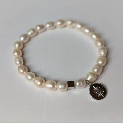 Armband Süßwasserperlen mit Sonnenanhänger silbern